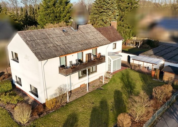 Zweifamilienhaus mit Einliegerwohnung in Lage