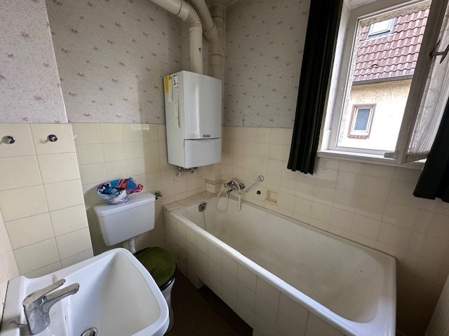 Doppelhaushälfte mit 3 Wohneinheiten in Schildesche