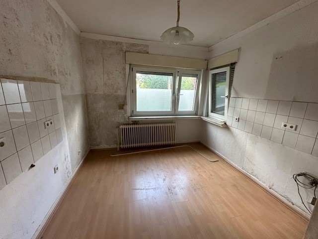 Doppelhaushälfte mit 3 Wohneinheiten in Schildesche