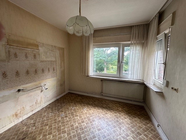 Doppelhaushälfte mit 3 Wohneinheiten in Schildesche