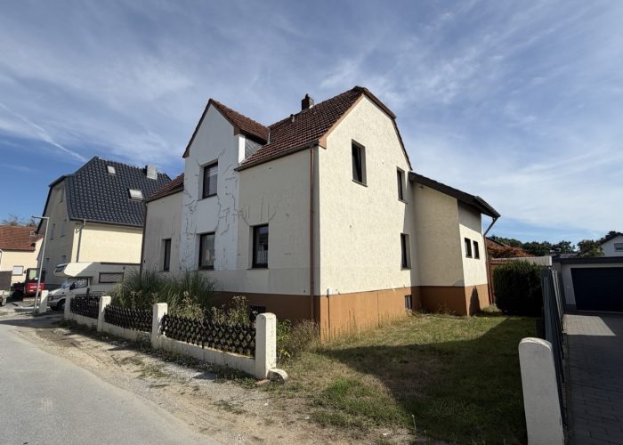 Zweifamilienhaus plus Baugrundstück in ruhiger Lage von Heepen